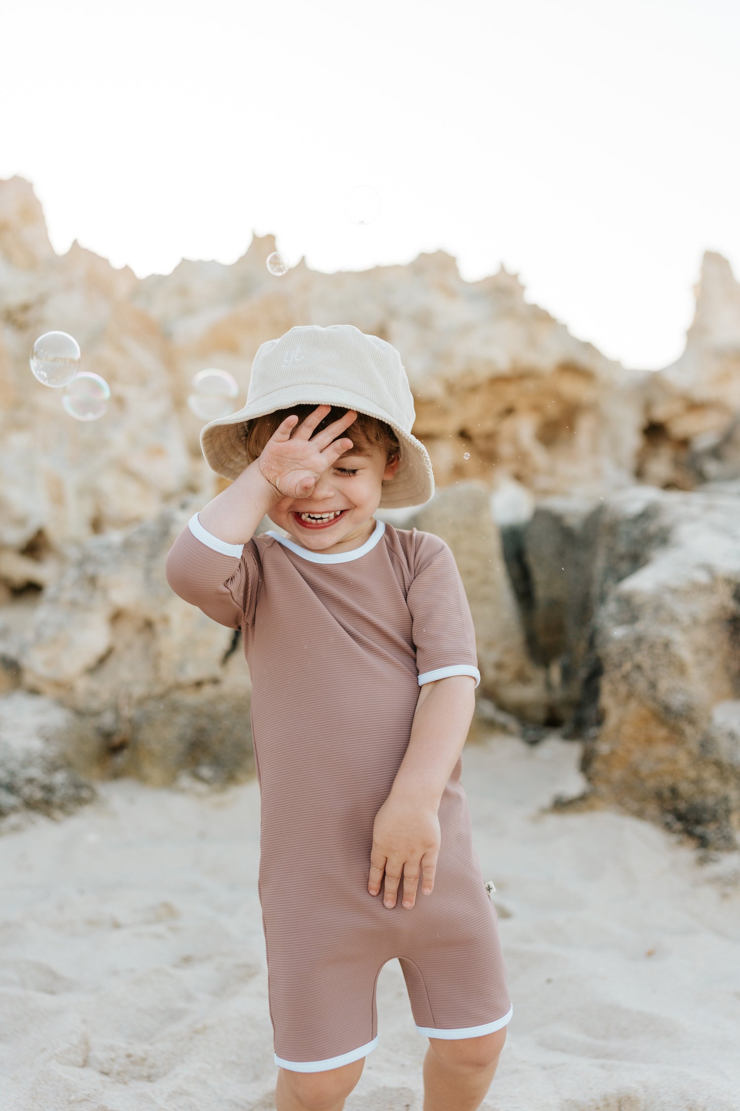 Boy in sale one piece swimsuit